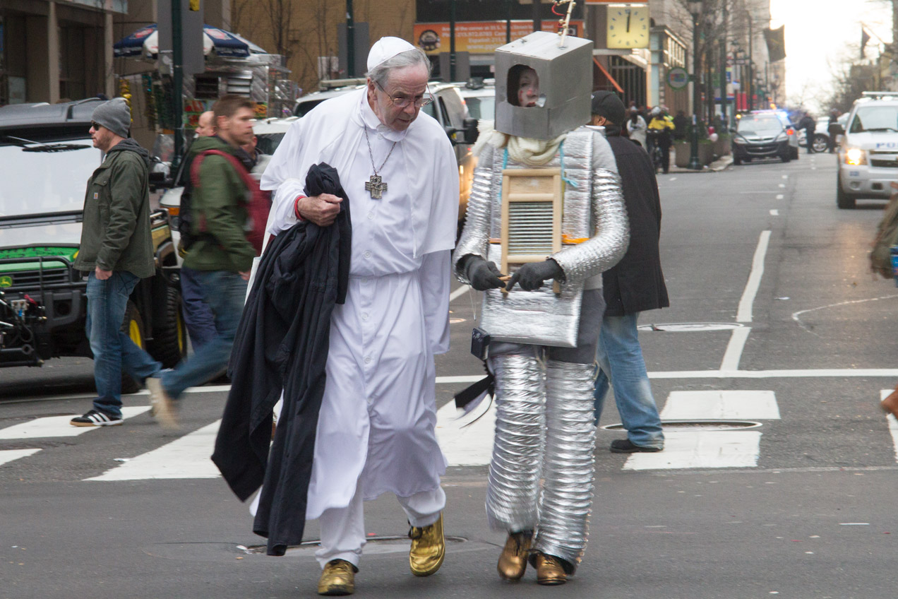 A pope and robot mummer