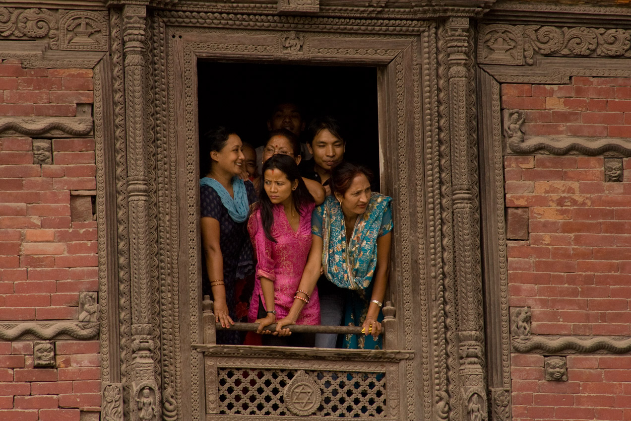 People crowded in a window