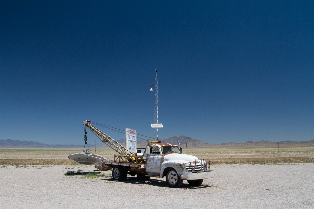 Towtruck carrying a small UFO